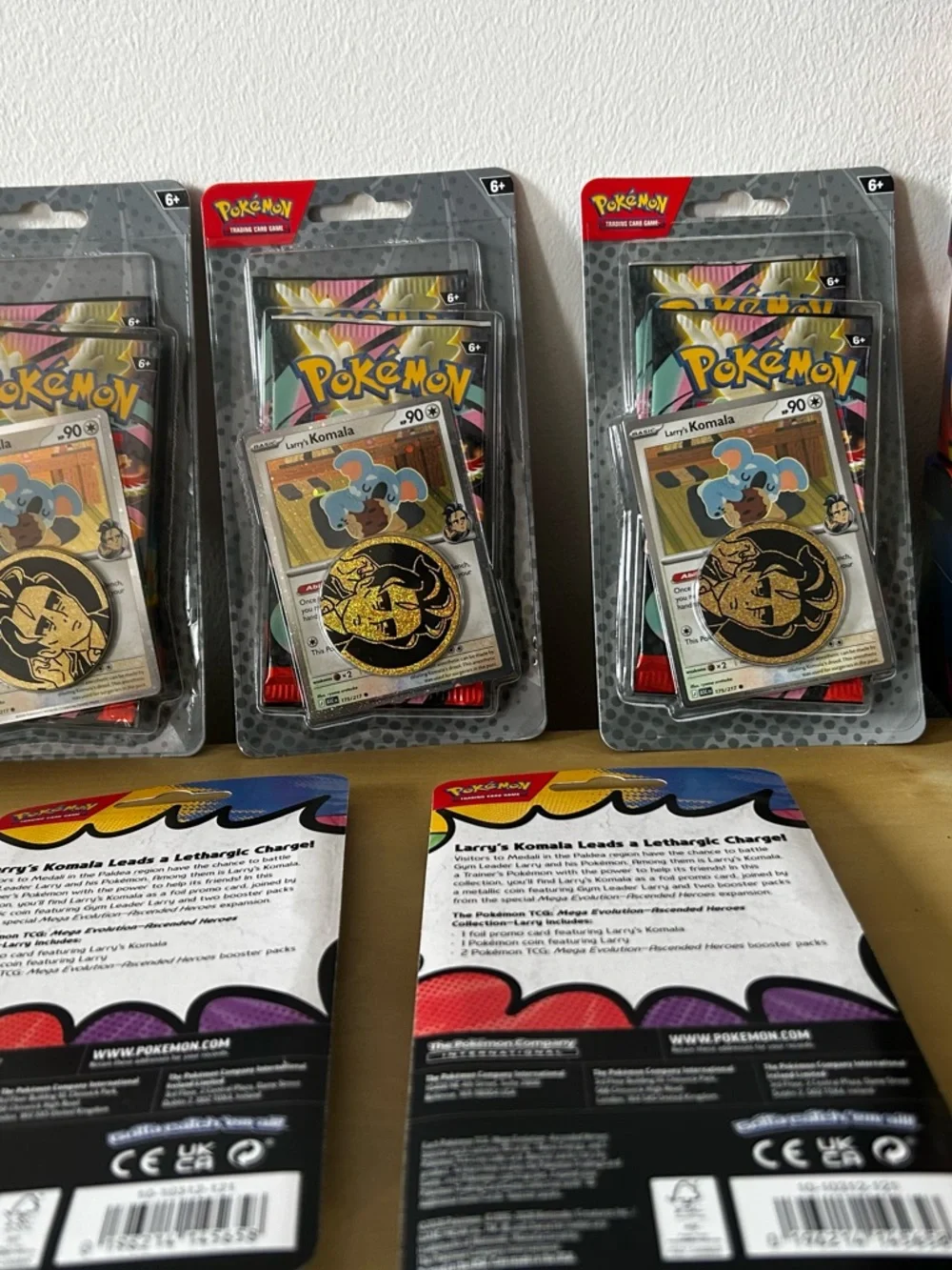 10 Pokémon Larry's Komala Promo Pack‎ - Blue, Gold